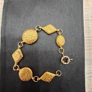 CHANEL Textured Gold Bracelet